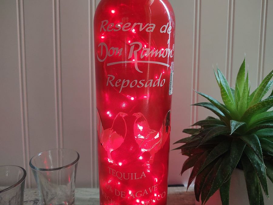 Poured glass of Don Ramon Tequila on a table